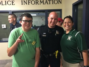  Bolton's Zachary Murphy (far left) with Bolton Officer Jonathan Couture and Tania Rich.  Courtesy photo